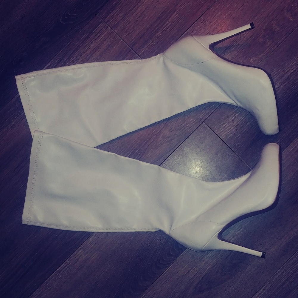 White knee high boots